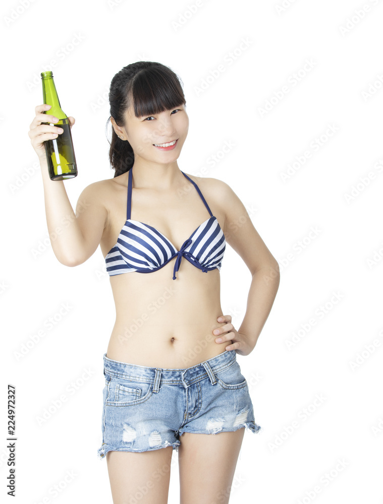 Chinese woman holding bottle of beer isolated on white background Chinese woman holding bottle of beer isolated on white background