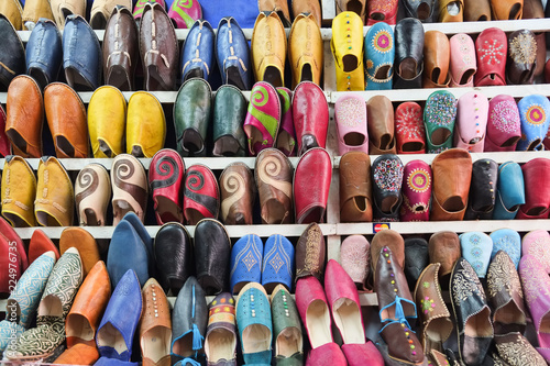 Colorful Moroccan shoes at Marrakech souk market, Morocco.