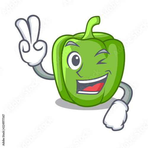 Two finger green peppers on the table cartoon