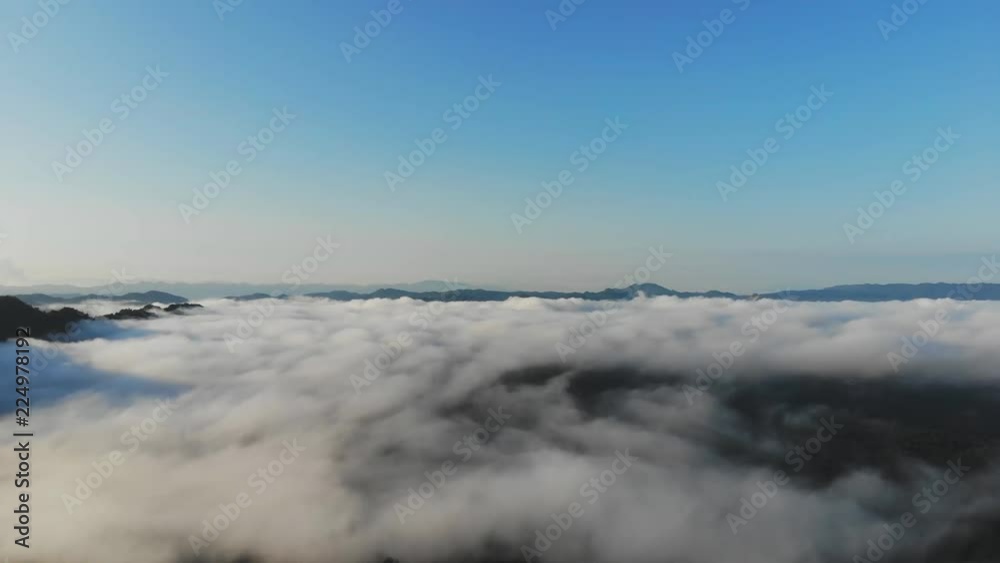 Landscape of Morning Mist with Mountain Layer at north of Thailand. Aerial View. Flying over the high mountains in beautiful clouds . Aerial video shot. Landscape of Morning Mist with Mountain Layer at north of Thailand. Aerial View. Flying over the high mountains in beautiful clouds . Aerial video shot.