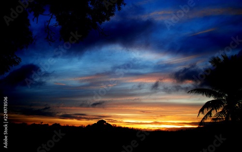 Beautiful natural sunset skies making the horizon look like it’s on fire © raksyBH