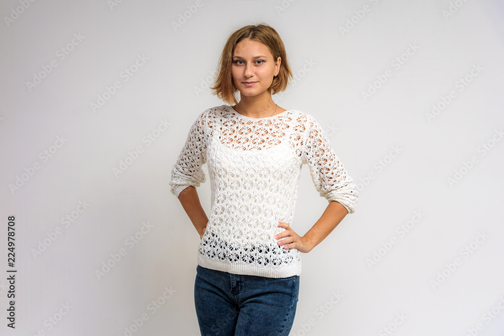 Portrait of a young beautiful girl on a white background. Portrait of a young beautiful girl on a white background.
