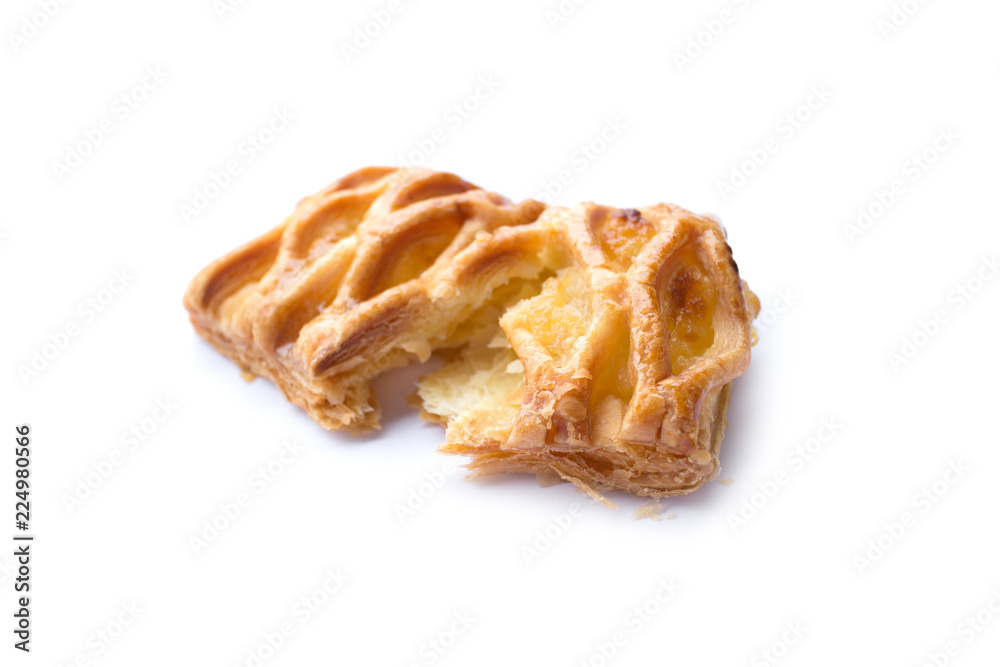 close up of crispy pineapple pie isolated on white background