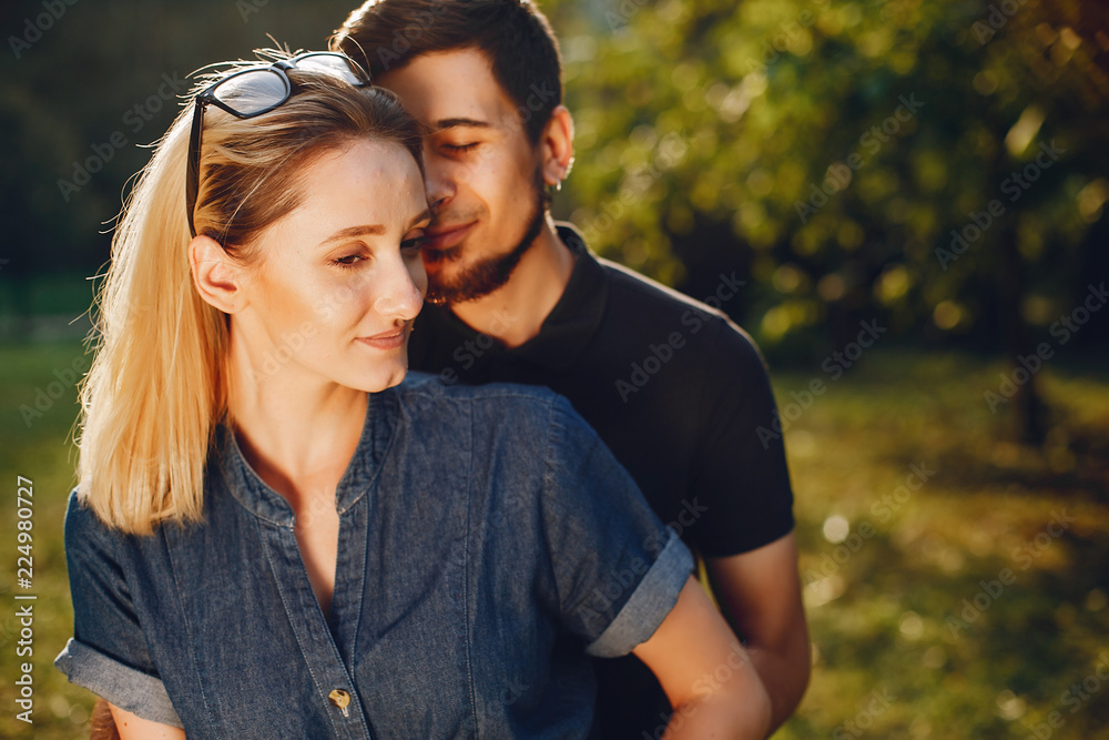 Fototapeta premium happy young couple in the park
