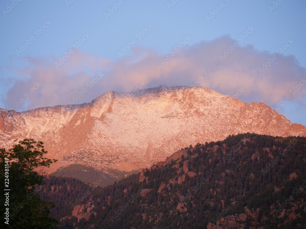 Close up view of the baren summit of Pikes Peak early in the morning seen from Manitou Springs, Colorado