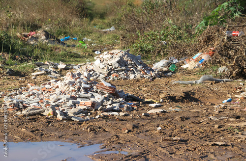 landfill with human waste that contaminates the environment