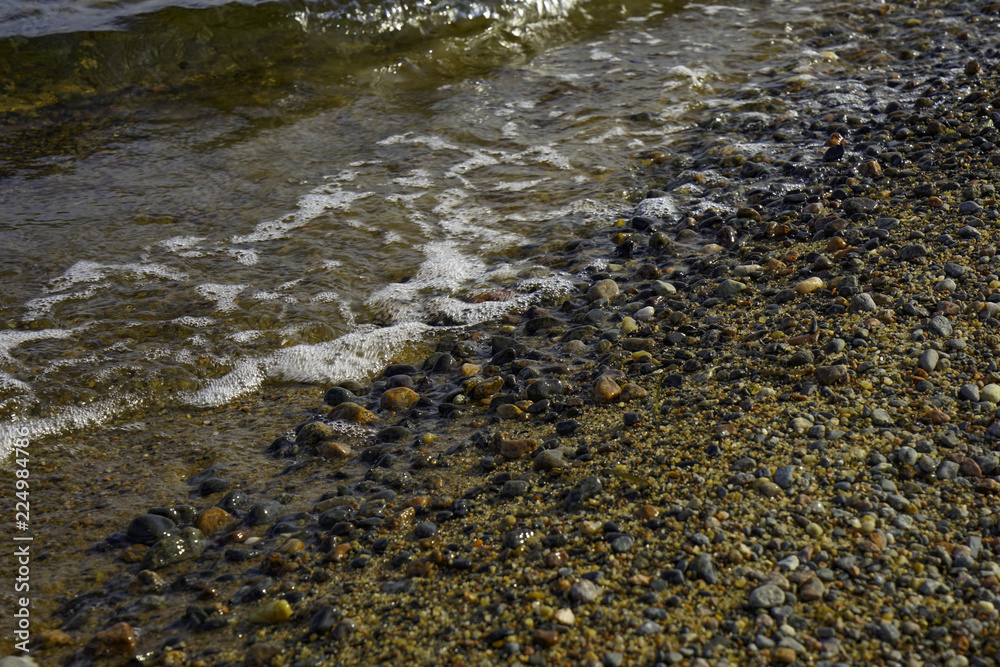 Wet stones and sea