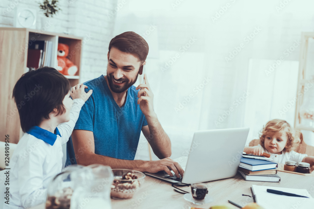 Fototapeta premium Works at Home. Upbringing. Looks After Children.