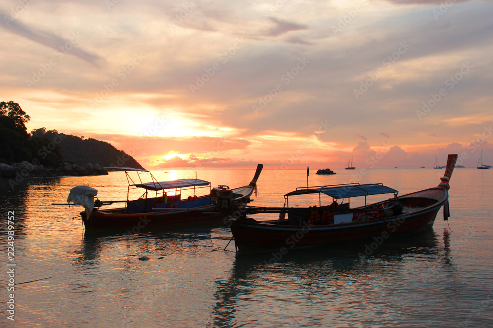 Beautiful sunset in Koh Lipe island with boats, Koh Lipe island, Thailand