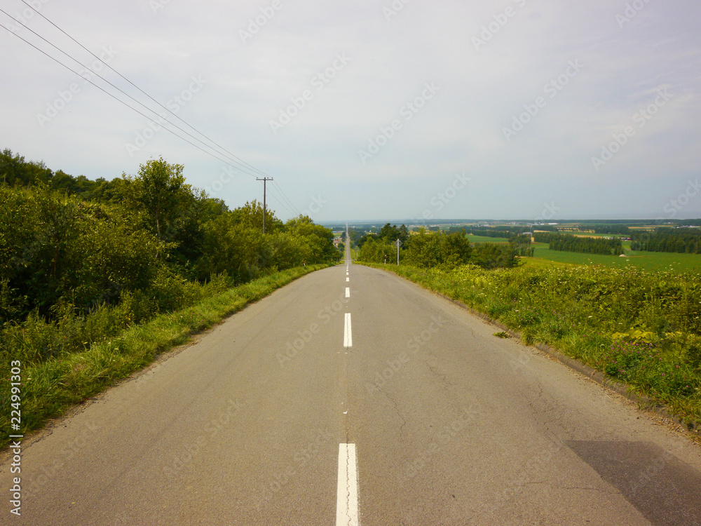Long straight road called road to heaven, Hokkaido, Japan Long straight road called road to heaven, Hokkaido, Japan