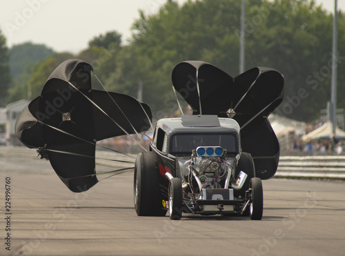 Dragster Deploys Chutes after Racing Run at the Drag Strip