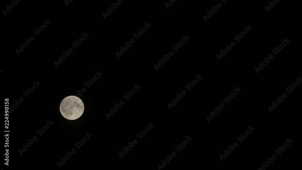 Time lapse. A full moon motion in the sky. Time lapse. A full moon motion in the sky.