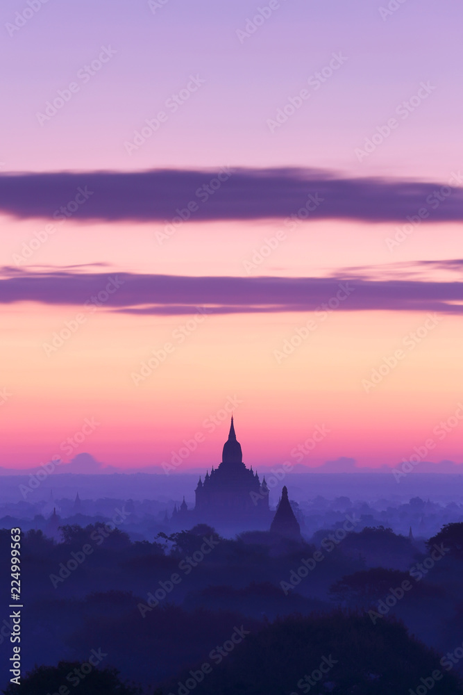 Silhouette of ancient pagode temples with fog after sunrise at Bagan in Myanmar Silhouette of ancient pagode temples with fog after sunrise at Bagan in Myanmar