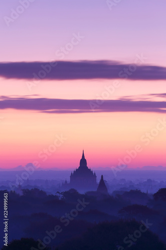 Silhouette of ancient pagode temples with fog after sunrise at Bagan in Myanmar © isarescheewin