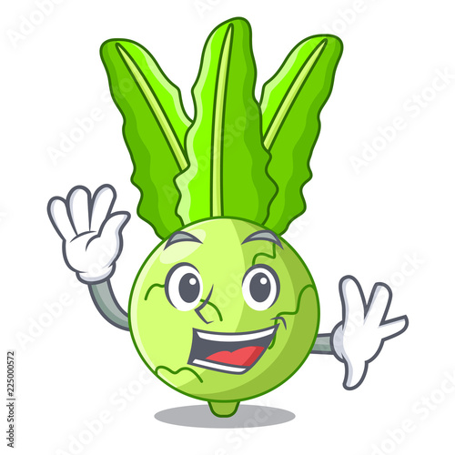 Waving character kohlrabi on a wooden table
