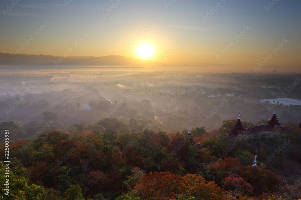 Beautiful scenery during sunrise, Mountains mist of top view at Mandalay hill in Myanma