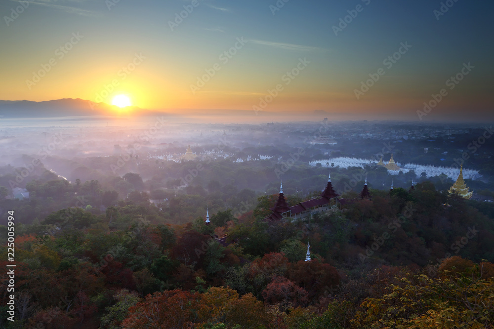 Beautiful scenery during sunrise, Mountains mist of top view at Mandalay hill in Myanma