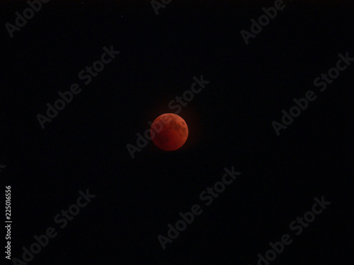 Total eclipse of the moon. Lunar eclipse 27. July 2018. Moon eclipse 2018. Red moon on the sky.