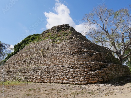 Old stone pyramid in Limones, one of the Mayn ruins in the village of Limones at Mexico Highway 307 in Costa Maya. 