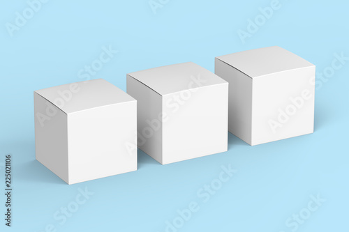 3 glossy paper white product boxes isolated on blue background mockup.