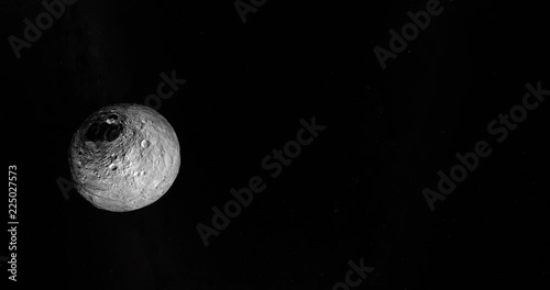 Asteroid Vesta gyrating and orbiting in the outer space photo