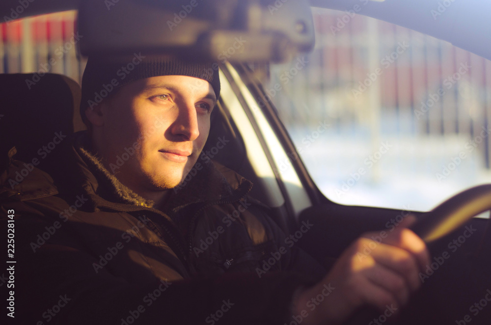 male driver drives a car male driver drives a car