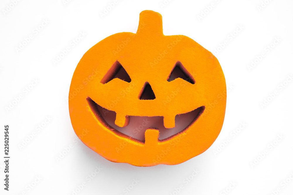 Halloween pumpkin face close up on the white background Halloween pumpkin face close up on the white background