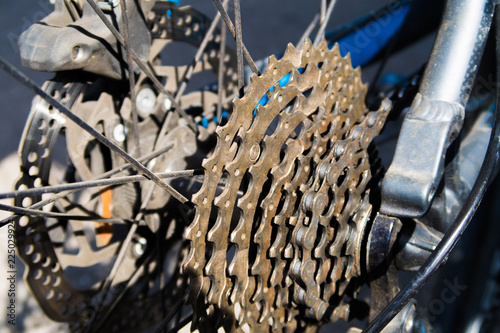 Rusty chain of blue bike in Switzerland