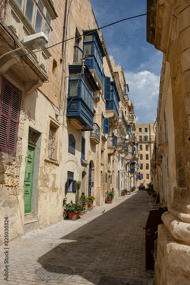 Narrow streets and buildings in Valletta, Malta