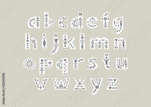 Vector bold white alphabet decorated with black nordic folk ornaments.  Display font, lowercase.