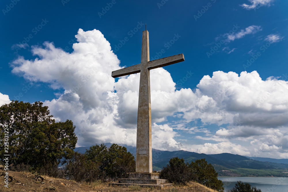The cross of Agios (Saint) Achillios on the islet at the Small Prespa Lake in northern Greece The cross of Agios (Saint) Achillios on the islet at the Small Prespa Lake in northern Greece