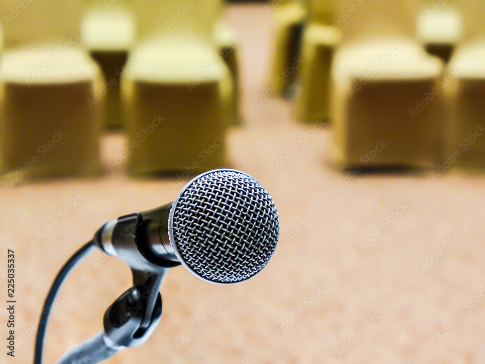 microphone on blur seminar room background microphone on blur seminar room background