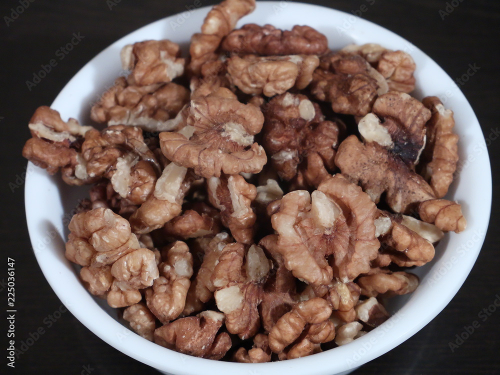 Dry fruits , walnuts akhrot against white background,Walnuts - Walnuts in black background, Walnuts On White Background, Akhrot in White Bowl on Wooden Background, Dry fruits , walnuts akhrot against white background,Walnuts - Walnuts in black background, Walnuts On White Background, Akhrot in White Bowl on Wooden Background,