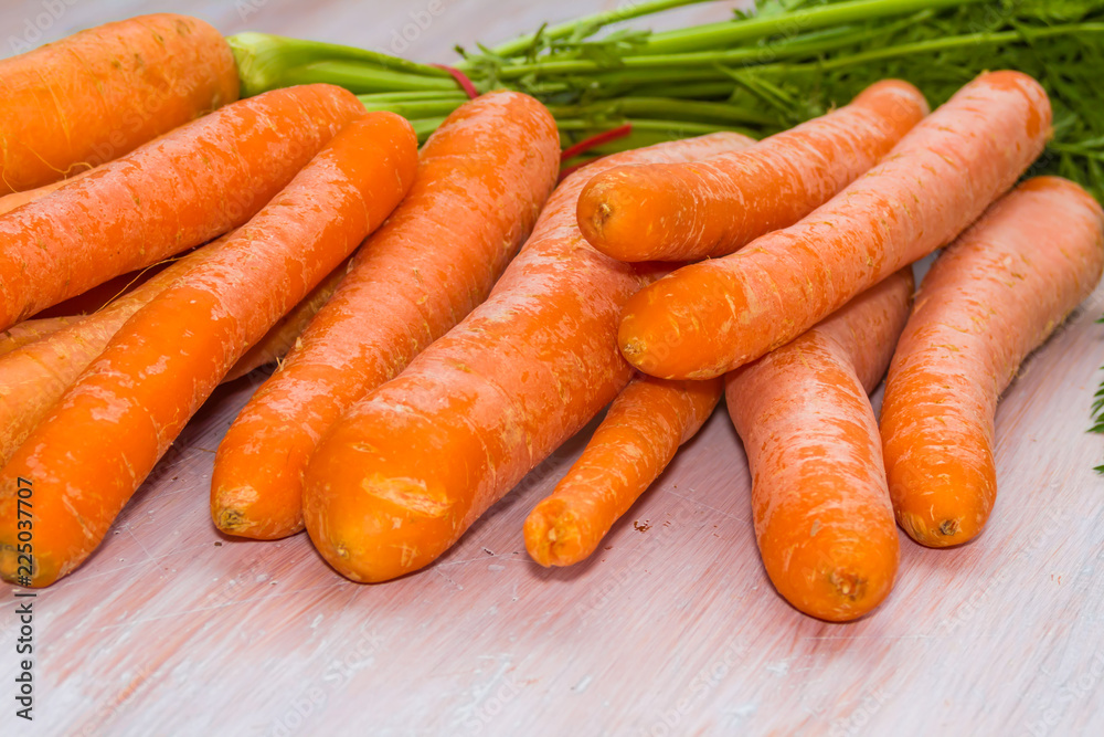 Fresh, raw, organic, bio, orange carrots. Healthy vegan vegetarian vegetable food Fresh, raw, organic, bio, orange carrots. Healthy vegan vegetarian vegetable food