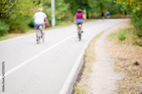 People on bikes out of focus