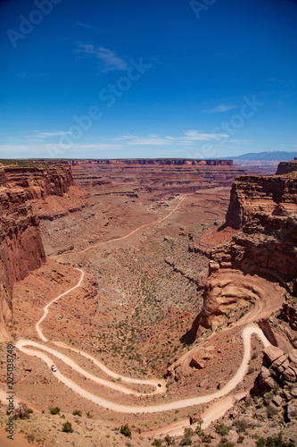 Shafer Trail Road switch-backs and traffic make this dirt road in Canyonland National Park very exciting to drive photo