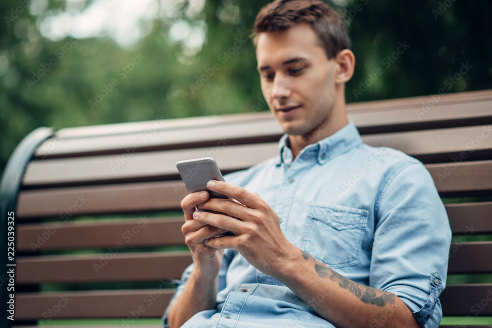 Fototapeta premium Phone addiction, addict man using smartphone