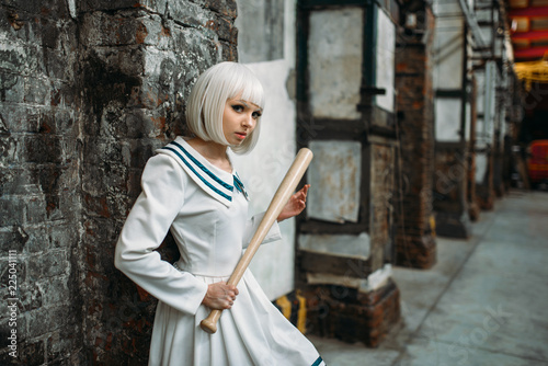 Photography Anime style girl with baseball bat, lolita