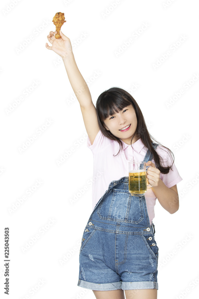 Chinese woman eating fried chicken drumstick isolated on white background Chinese woman eating fried chicken drumstick isolated on white background