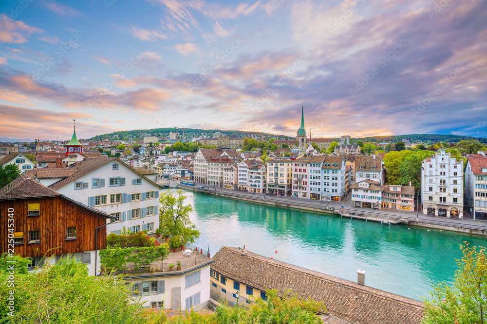 Fototapeta premium Beautiful view of historic city center of Zurich at sunset