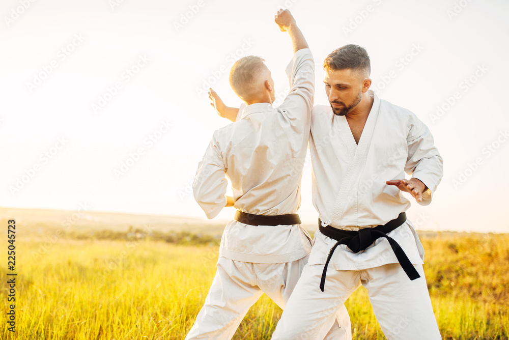 Two karate fighters, training fight in action