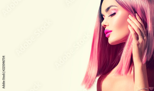 Fotografi Beauty model girl with perfect healthy hair and beautiful makeup Ombre pink with