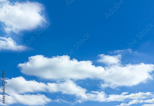 Blue sky background with white clouds. 