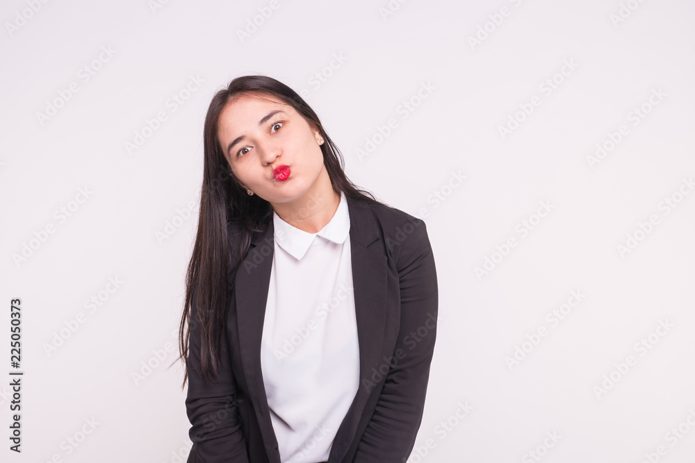 Funny young asian woman on white background with copy space Funny young asian woman on white background with copy space