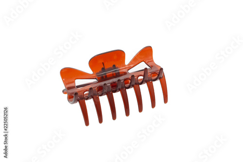 colored hair clips in closeup isolated on white background