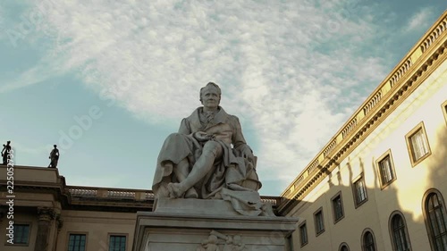 Medium shot of statue of Alexander von Humboldt at Humboldt University, Berlin, Germany