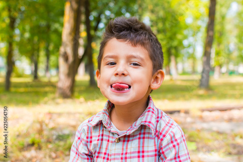 boy is fooling around in the open air