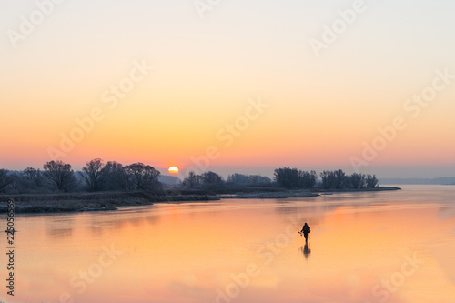 sunrise on a ice river 