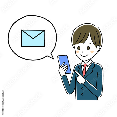 スマホを操作する男子学生