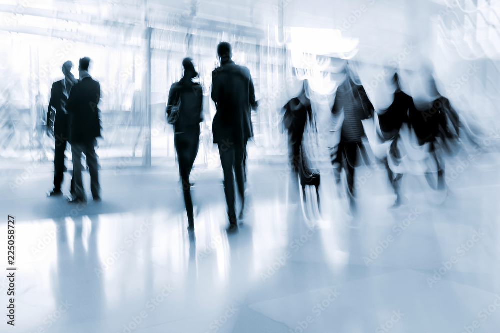 group of people in the lobby business center and blue tonality